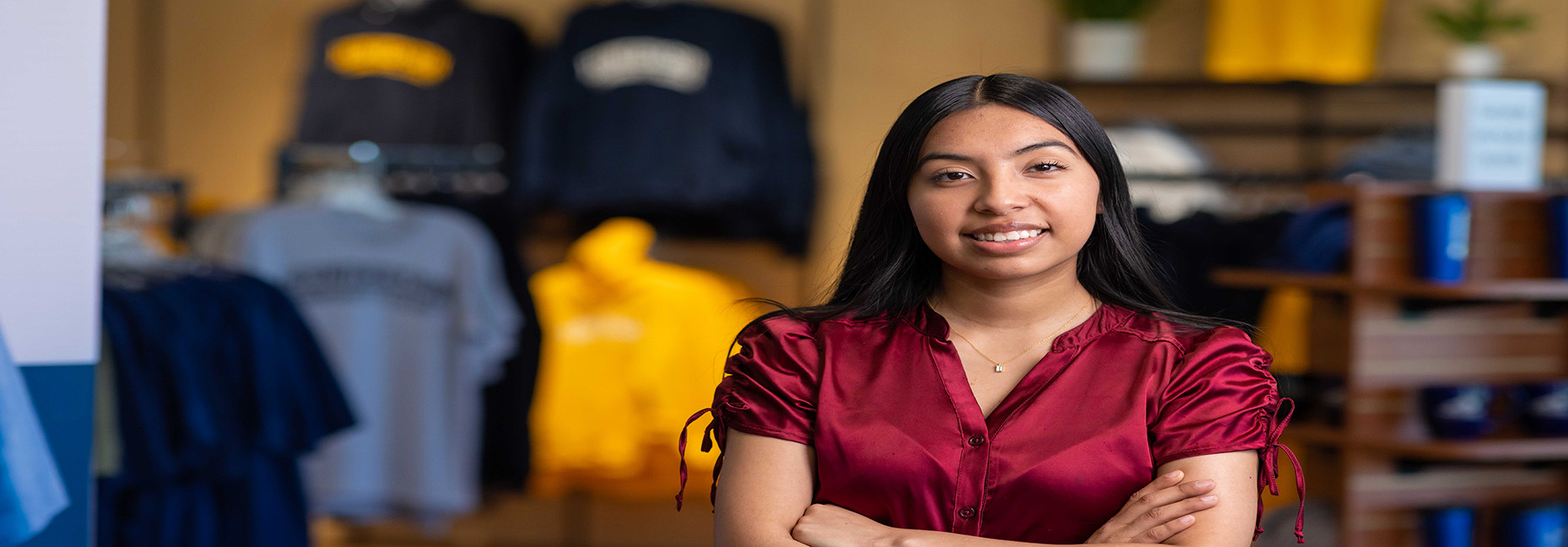 a female student standing in the HCC bookstore