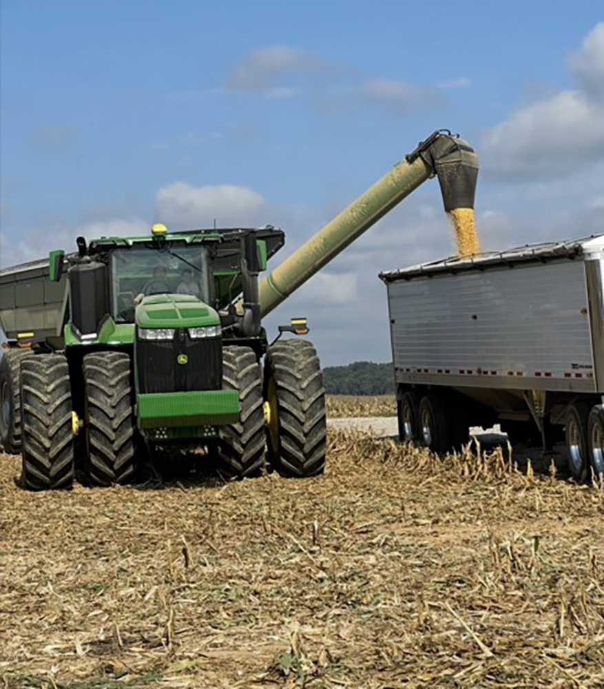 farm equipment harvesting corn